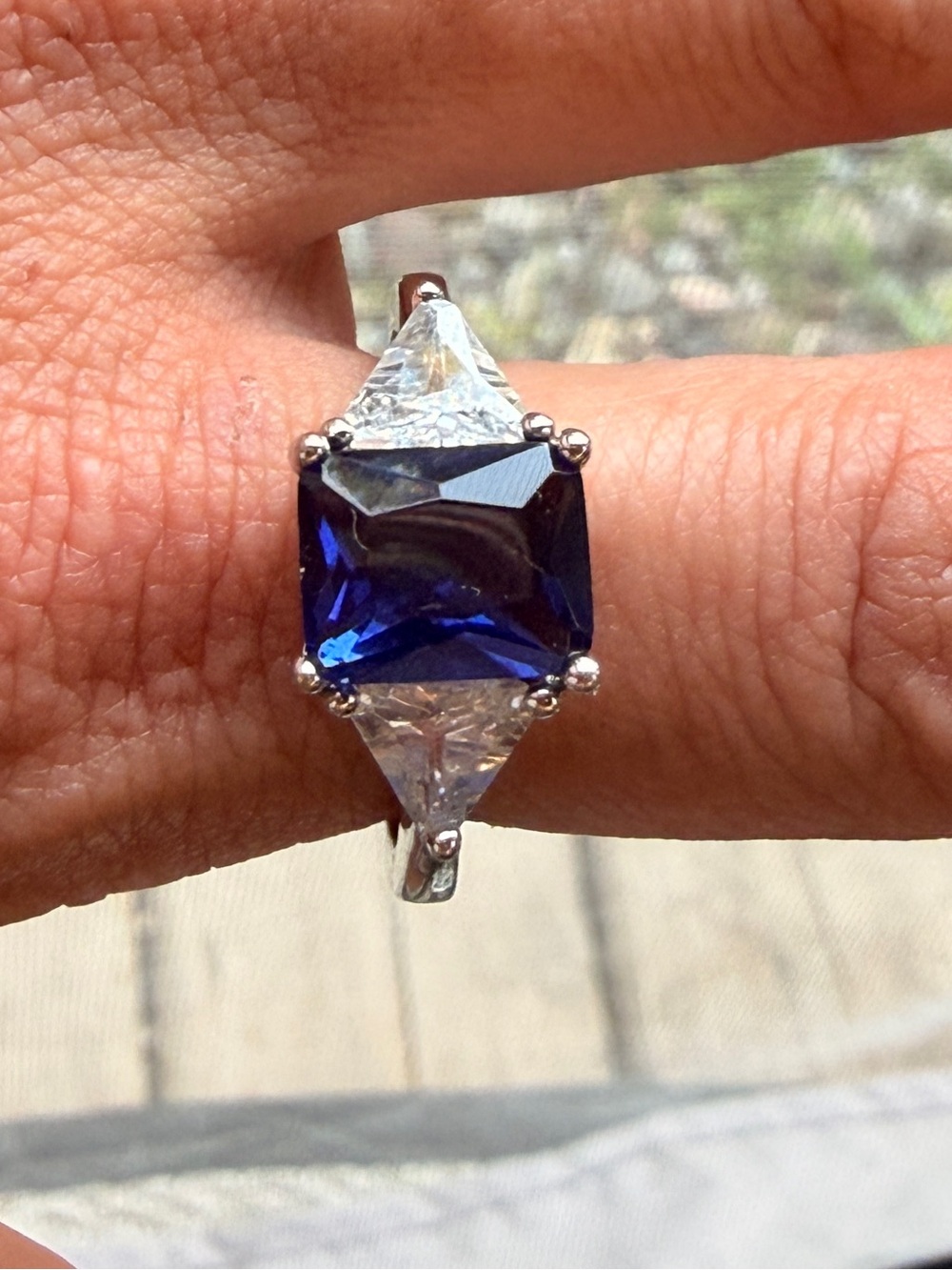 Silver Ring with Deep Blue Square Center Stone and Clear Side Stones Sz9